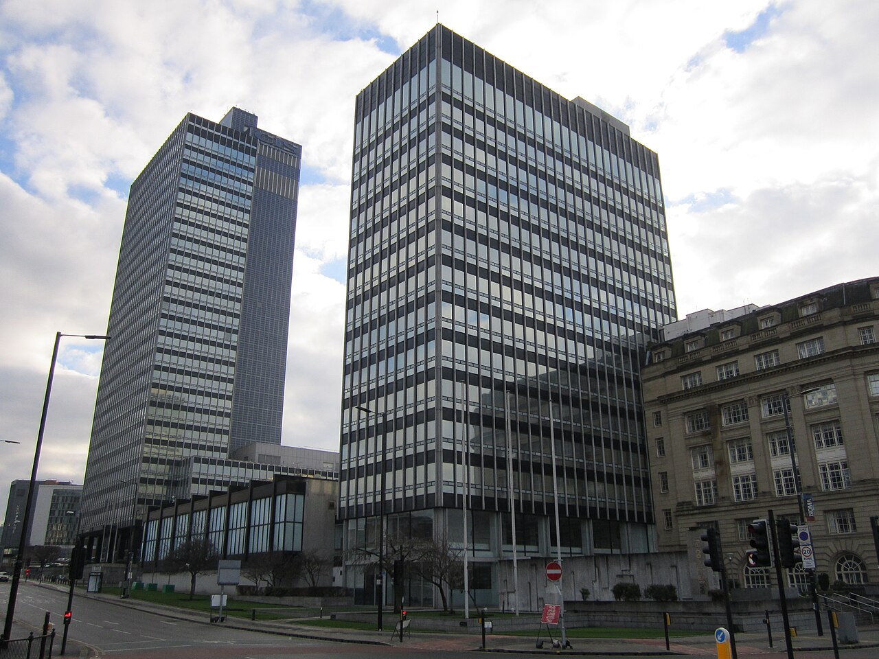 CIS Tower and New Century House, two gridded office slabs in Manchester